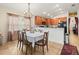 Formal dining room features a table with six chairs and kitchen access at 14284 Finsbury Dr, Spring Hill, FL 34609