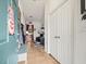 Bright and spacious entryway with bench seating and coat rack at 14284 Finsbury Dr, Spring Hill, FL 34609