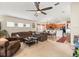 Spacious living room offers ample seating and open floor plan at 14284 Finsbury Dr, Spring Hill, FL 34609