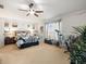 Large main bedroom with a king-size bed, exercise bike and plenty of space at 14284 Finsbury Dr, Spring Hill, FL 34609