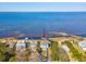 Aerial view showing home's waterfront location and private dock access at 2013 Gulfview Dr, Holiday, FL 34691