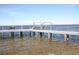 Private dock with a bench and lift for water access at 2013 Gulfview Dr, Holiday, FL 34691
