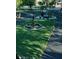 Landscaped front yard with a fountain and manicured lawn at 2013 Gulfview Dr, Holiday, FL 34691