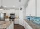 Modern kitchen with granite countertops and stainless steel appliances at 2013 Gulfview Dr, Holiday, FL 34691