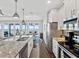 Modern kitchen with stainless steel appliances and granite countertops at 2013 Gulfview Dr, Holiday, FL 34691
