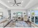 Bright living room with ocean views, fireplace, and comfortable seating at 2013 Gulfview Dr, Holiday, FL 34691