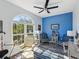 Bright office space with comfortable seating and built-in shelving at 2013 Gulfview Dr, Holiday, FL 34691