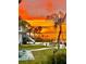 Stunning sunset view over the water from the backyard at 2013 Gulfview Dr, Holiday, FL 34691