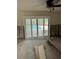 Renovated interior room with pool view and new shutters at 3039 Sandpiper Ct, Clearwater, FL 33762