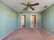 Bedroom with ceiling fan and carpet flooring at 3820 59Th W Ave # 3820, Bradenton, FL 34210