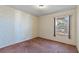Simple bedroom with carpet and window at 3820 59Th W Ave # 3820, Bradenton, FL 34210
