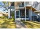 Exterior view with teal door and stairs at 3820 59Th W Ave # 3820, Bradenton, FL 34210
