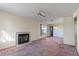 Living room with fireplace and carpet at 3820 59Th W Ave # 3820, Bradenton, FL 34210
