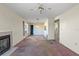 Living room with fireplace and view to kitchen at 3820 59Th W Ave # 3820, Bradenton, FL 34210