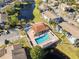 Community pool and spa with lounge chairs at 3820 59Th W Ave # 3820, Bradenton, FL 34210