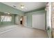 Bedroom with mirrored wall and double door closet at 4412 Lake In The Woods Dr, Spring Hill, FL 34607