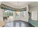 Bright breakfast nook with pool view and access to the backyard at 4412 Lake In The Woods Dr, Spring Hill, FL 34607