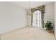 Bright dining room with window and neutral carpeting at 4412 Lake In The Woods Dr, Spring Hill, FL 34607