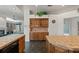 Kitchen features an abundance of cabinetry and a built-in buffet at 4412 Lake In The Woods Dr, Spring Hill, FL 34607