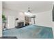 Living room with fireplace and built-in shelving at 4412 Lake In The Woods Dr, Spring Hill, FL 34607