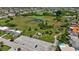 Aerial view showcasing a large vacant lot near residential area at 4424 Floramar Ter, New Port Richey, FL 34652