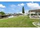 Spacious backyard with patio furniture and fire pit at 4424 Floramar Ter, New Port Richey, FL 34652