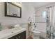 Updated bathroom with white subway tile and a bathtub at 4424 Floramar Ter, New Port Richey, FL 34652