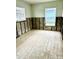 Unfinished bedroom with exposed framing and flooring at 4424 Floramar Ter, New Port Richey, FL 34652