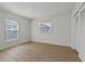 Spacious bedroom with light floors and large closet at 4424 Floramar Ter, New Port Richey, FL 34652