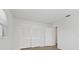 Bedroom with double door closet and window at 4424 Floramar Ter, New Port Richey, FL 34652