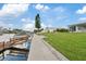 Private dock with walkway leading to the water at 4424 Floramar Ter, New Port Richey, FL 34652