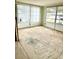 Sunroom with water views and unfinished flooring at 4424 Floramar Ter, New Port Richey, FL 34652