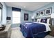 Themed bedroom with a Star Wars comforter and coordinating decor at 4515 Spire Run, Lakewood Ranch, FL 34211