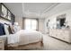 Spacious main bedroom with large window and dresser at 4515 Spire Run, Lakewood Ranch, FL 34211
