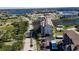Aerial view of condo building near waterfront with parking at 4620 Bay Blvd # 1145, Port Richey, FL 34668