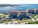 Condo building's aerial view highlighting waterfront access and parking at 4620 Bay Blvd # 1145, Port Richey, FL 34668