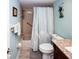 Clean bathroom with tub shower and granite vanity at 4620 Bay Blvd # 1145, Port Richey, FL 34668