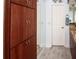 Bathroom with a large wooden cabinet and granite countertop at 4620 Bay Blvd # 1145, Port Richey, FL 34668