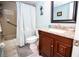 Bathroom with tub/shower, granite countertop, and linen closet at 4620 Bay Blvd # 1145, Port Richey, FL 34668