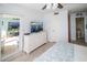 Bedroom with access to private balcony and ensuite bathroom at 4620 Bay Blvd # 1145, Port Richey, FL 34668