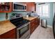 Kitchen boasts stainless steel appliances and granite countertops at 4620 Bay Blvd # 1145, Port Richey, FL 34668