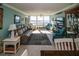 Spacious living room with hardwood floors, ample seating, and water views at 4620 Bay Blvd # 1145, Port Richey, FL 34668