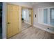 Office with mirrored closet doors and wood floors at 4620 Bay Blvd # 1145, Port Richey, FL 34668