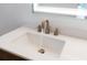 Bathroom with modern single sink, quartz countertop, and brushed gold faucet at 4852 Capron St, New Port Richey, FL 34653