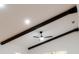 High ceiling with exposed wooden beams and a ceiling fan at 4852 Capron St, New Port Richey, FL 34653