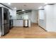 Modern kitchen featuring stainless steel appliances and granite countertops at 4852 Capron St, New Port Richey, FL 34653