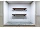 Kitchen featuring floating shelves and granite countertops at 4852 Capron St, New Port Richey, FL 34653