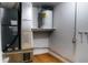 Laundry area with water heater and HVAC unit at 4852 Capron St, New Port Richey, FL 34653