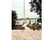 Brick patio with walkway to the waterfront and sailboat at 4907 Floramar Ter, New Port Richey, FL 34652