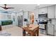 Bright kitchen with stainless steel appliances and an island at 4907 Floramar Ter, New Port Richey, FL 34652